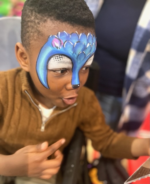 Boy with Sonic the Hedghog face paint in telford